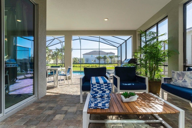 sunroom featuring a wealth of natural light