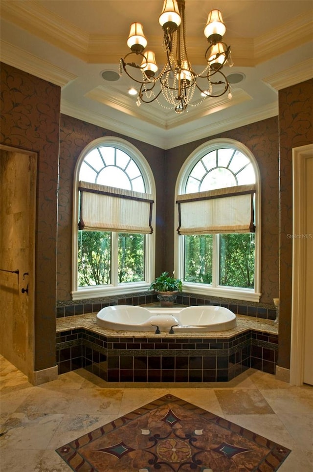 bathroom featuring tile flooring, a wealth of natural light, and tiled bath