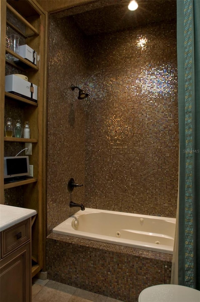 full bathroom featuring toilet, tile floors, vanity, and shower / tub combo with curtain