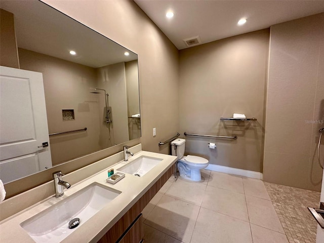 bathroom featuring walk in shower, dual bowl vanity, toilet, and tile floors