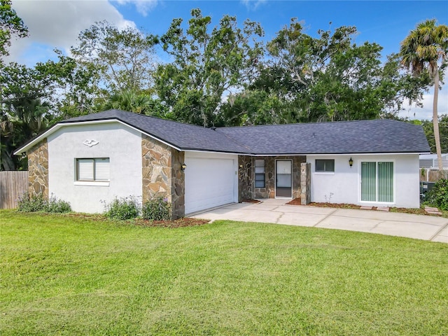 view of front of house with an attached garage, stone siding, stucco siding, and a front yard