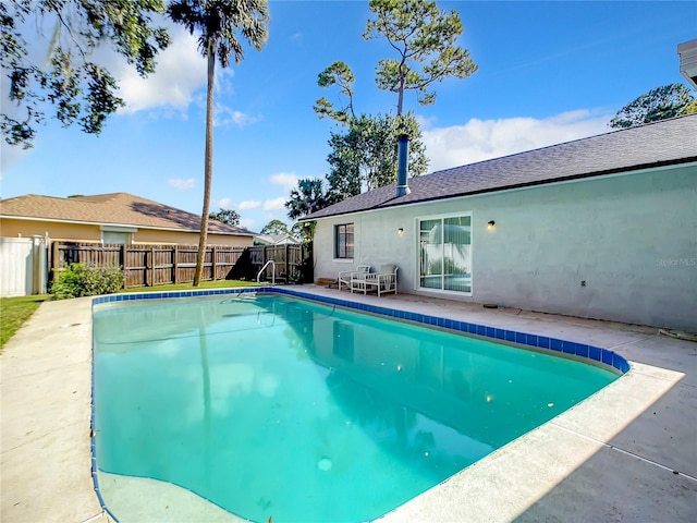 view of pool with a fenced in pool and a fenced backyard