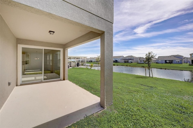 view of yard with a water view