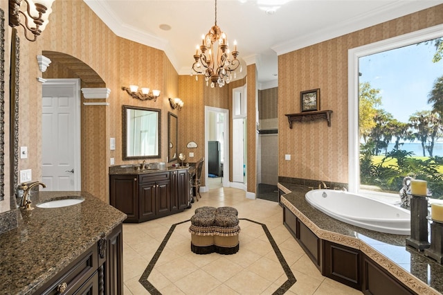 bathroom with tile flooring, ornamental molding, and a bathtub