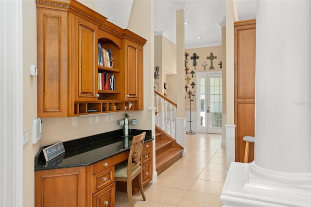 home office featuring crown molding, ornate columns, and light tile flooring