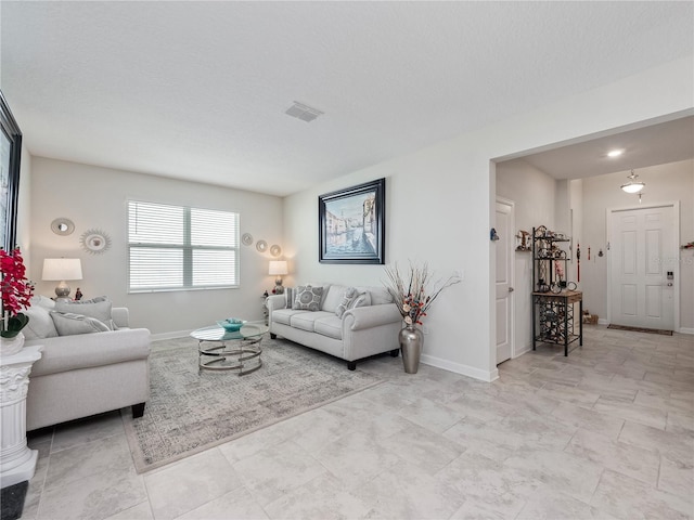 living room with light tile floors