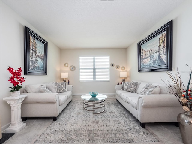 living room featuring light tile floors