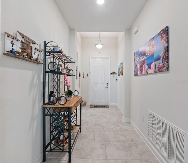 view of tiled entrance foyer