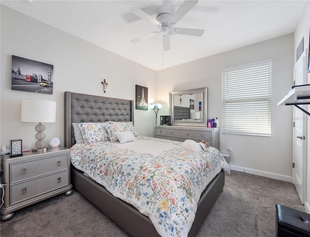 carpeted bedroom with ceiling fan