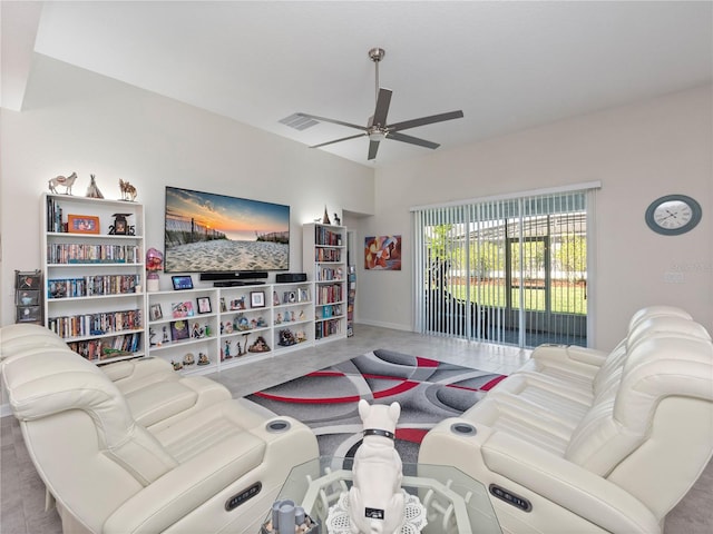 carpeted living room featuring ceiling fan