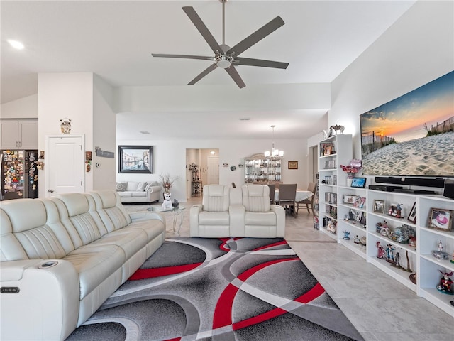 living room with ceiling fan with notable chandelier