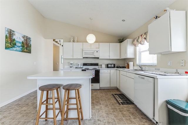 kitchen featuring a breakfast bar area, white appliances, vaulted ceiling, white cabinets, and light tile floors