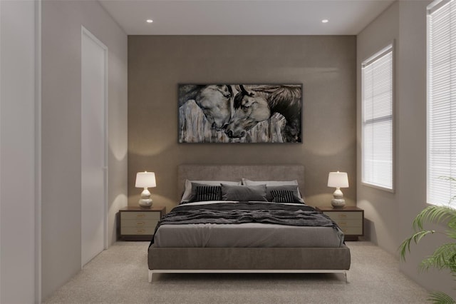 bedroom featuring light colored carpet