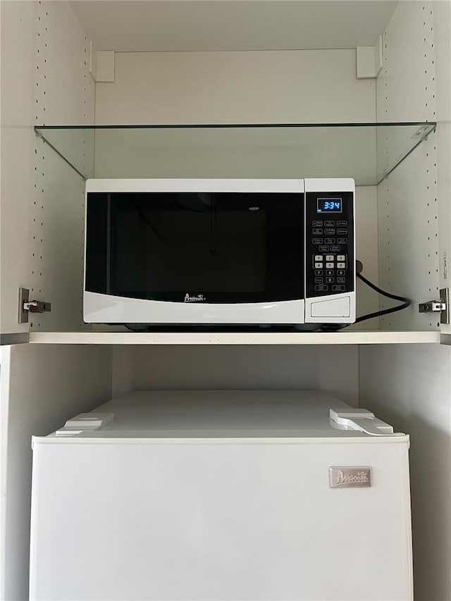 interior details featuring fridge