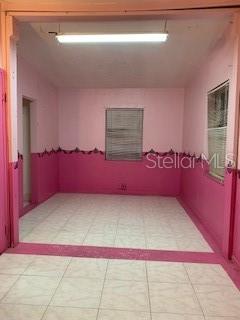 bathroom with tile flooring