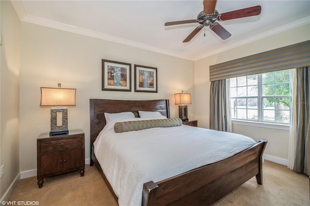 bedroom with light carpet, ceiling fan, and crown molding