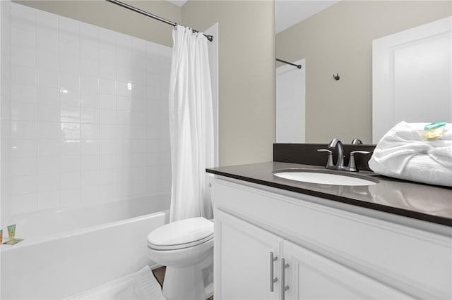 full bathroom featuring oversized vanity, shower / bath combination with curtain, and toilet