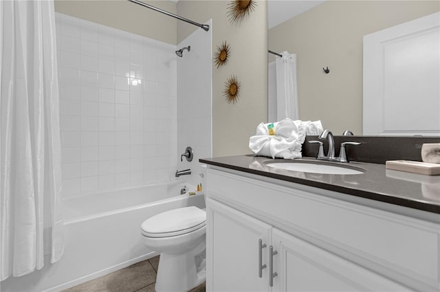 full bathroom featuring vanity, toilet, tile flooring, and shower / bath combo with shower curtain