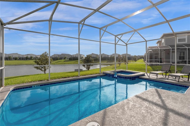 view of pool with a lanai, an in ground hot tub, and a patio area