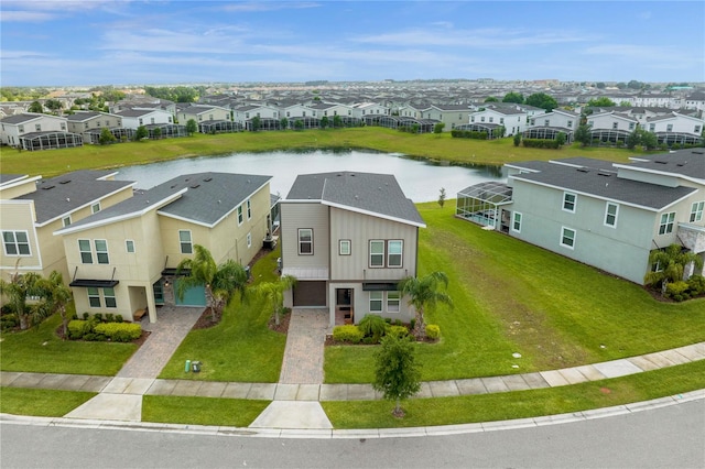 bird's eye view with a water view