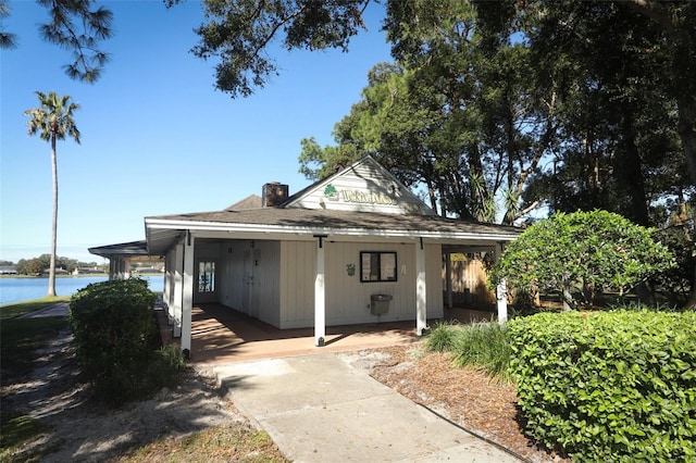 view of front facade featuring a water view