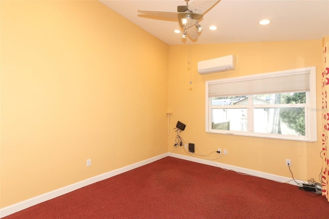 spare room with carpet flooring, ceiling fan, vaulted ceiling, and a wall mounted AC