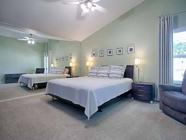 bedroom featuring carpet flooring, ceiling fan, and high vaulted ceiling