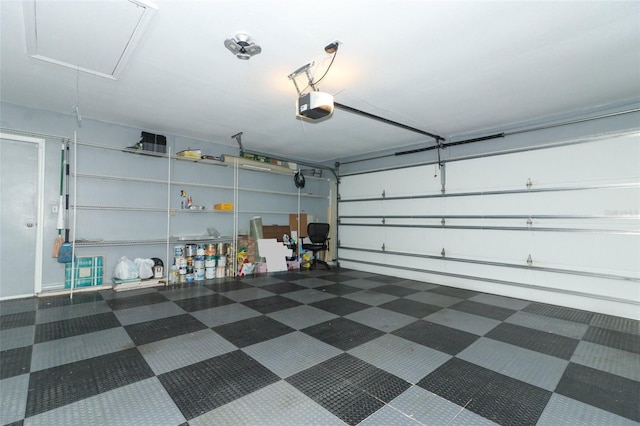 garage featuring a garage door opener