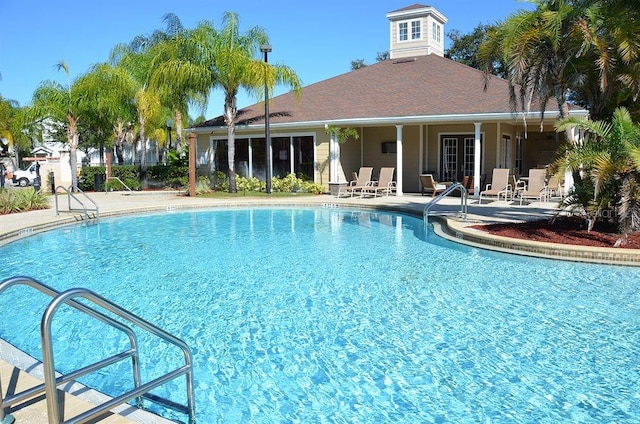 view of swimming pool featuring a patio