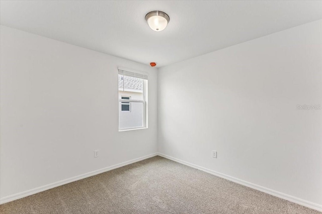 empty room featuring carpet floors