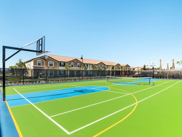 view of sport court with tennis court