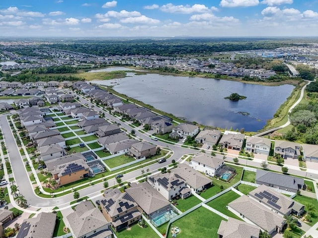 drone / aerial view with a water view