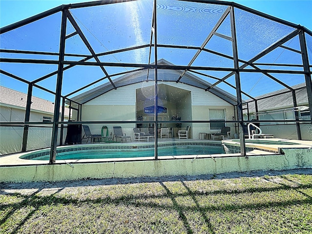 view of pool featuring a patio area and a lanai