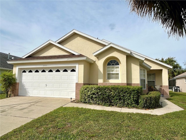 ranch-style house featuring brick siding, stucco siding, a garage, driveway, and a front lawn