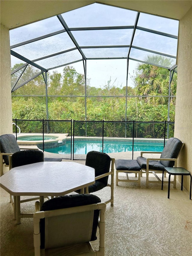 view of patio / terrace featuring a lanai