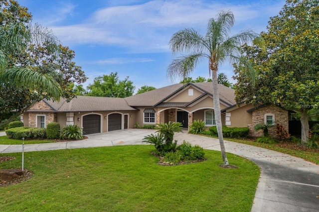 single story home with a front yard and a garage