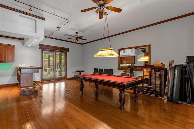 recreation room with billiards, ceiling fan, track lighting, wood-type flooring, and a textured ceiling