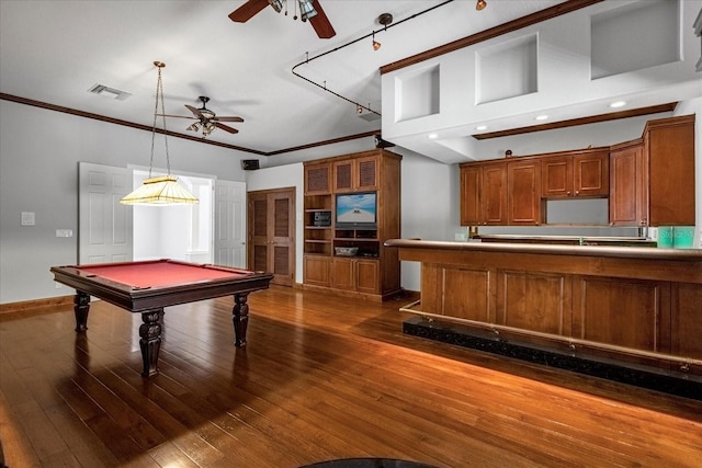 rec room with ceiling fan, pool table, dark hardwood / wood-style flooring, and ornamental molding