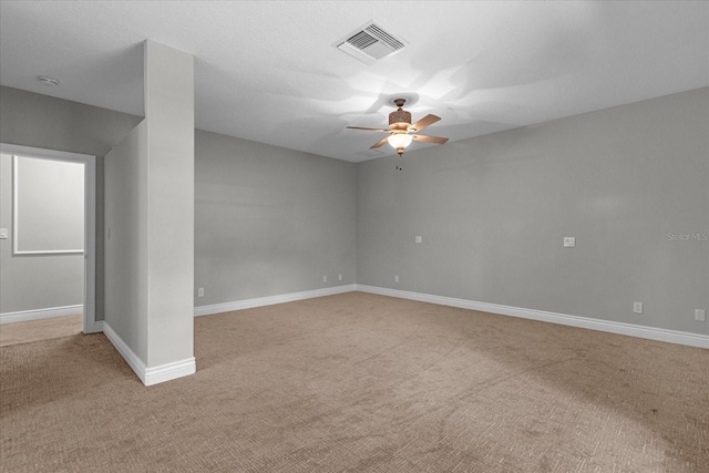 carpeted empty room with ceiling fan