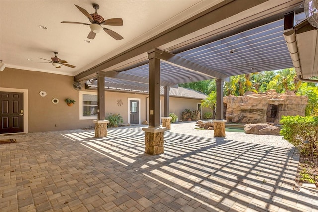 view of patio featuring ceiling fan and a pergola