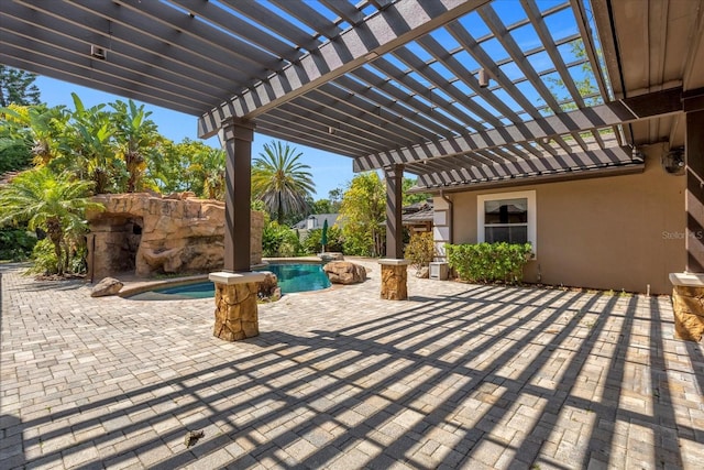 view of terrace with a pergola