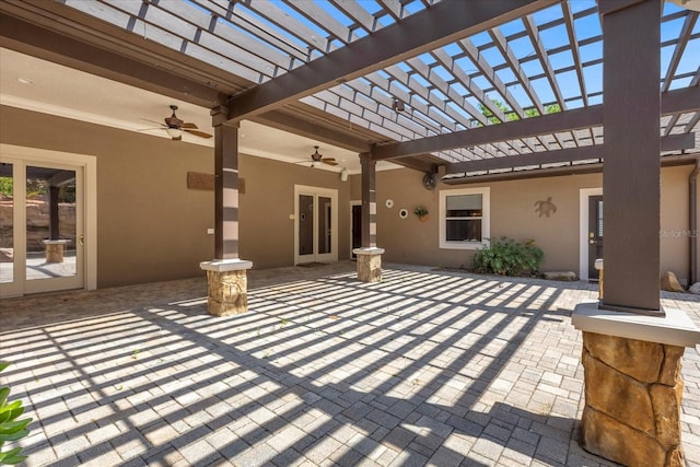 view of patio with french doors, ceiling fan, and a pergola