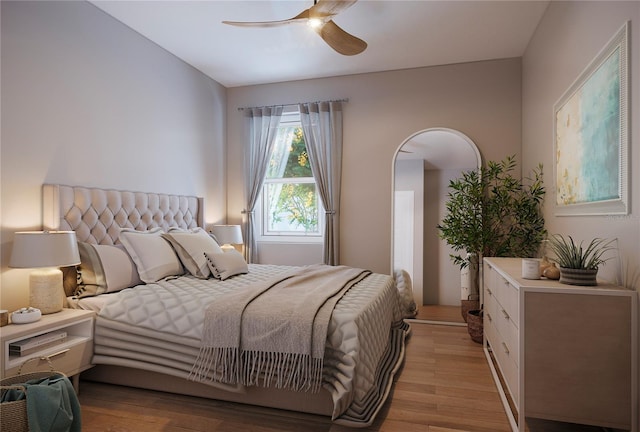 bedroom featuring light wood-type flooring and ceiling fan