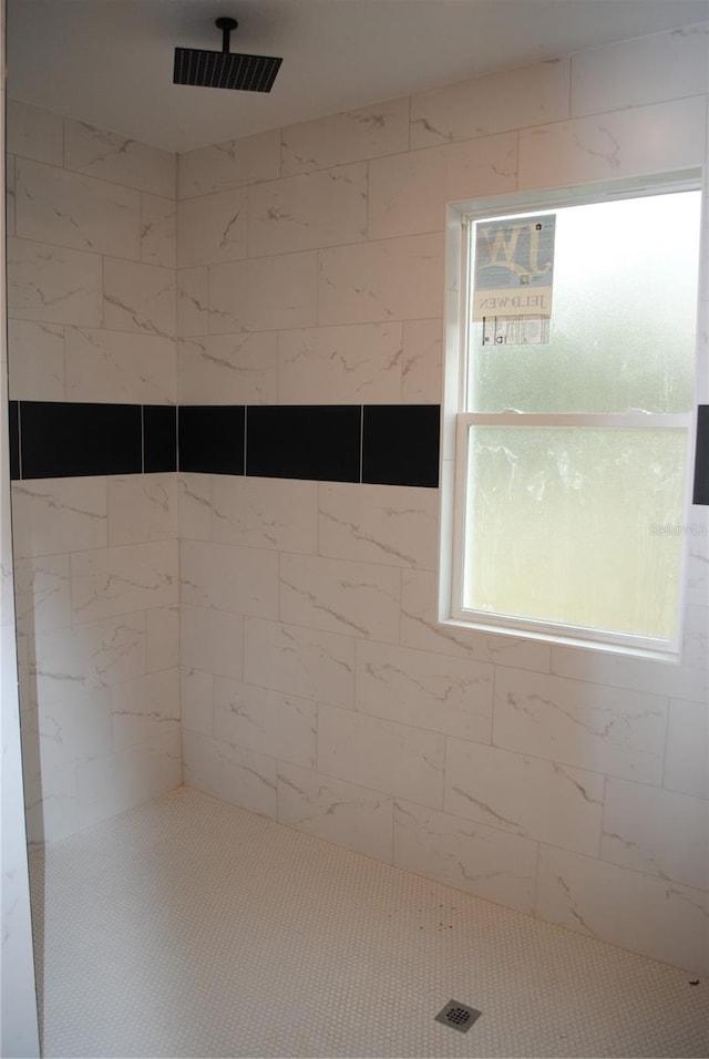 interior space with a tile shower