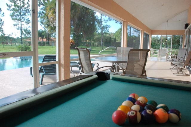 recreation room with billiards and lofted ceiling