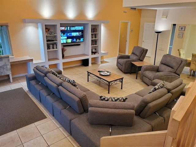 tiled living room with built in shelves