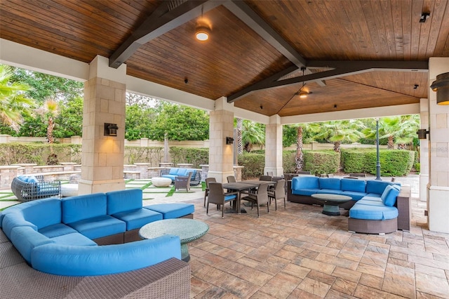 view of terrace with a gazebo and an outdoor hangout area