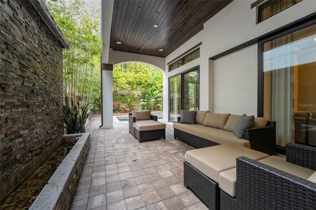 view of terrace with an outdoor living space