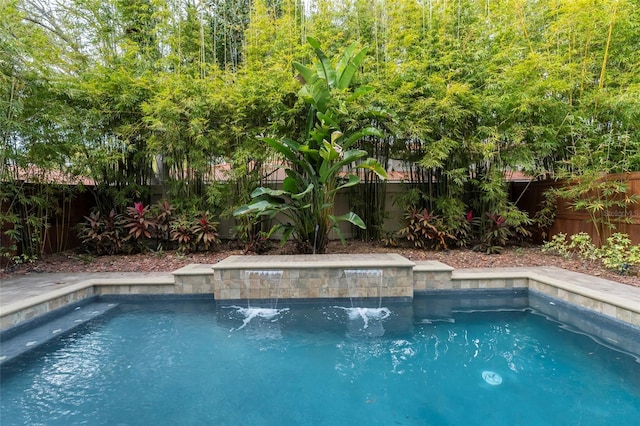 view of pool featuring pool water feature