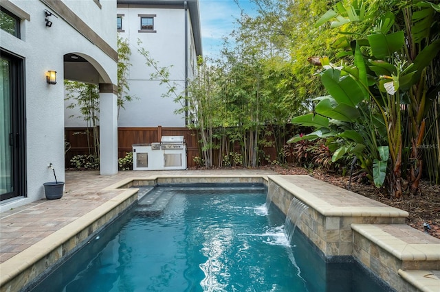 view of swimming pool featuring a grill and pool water feature